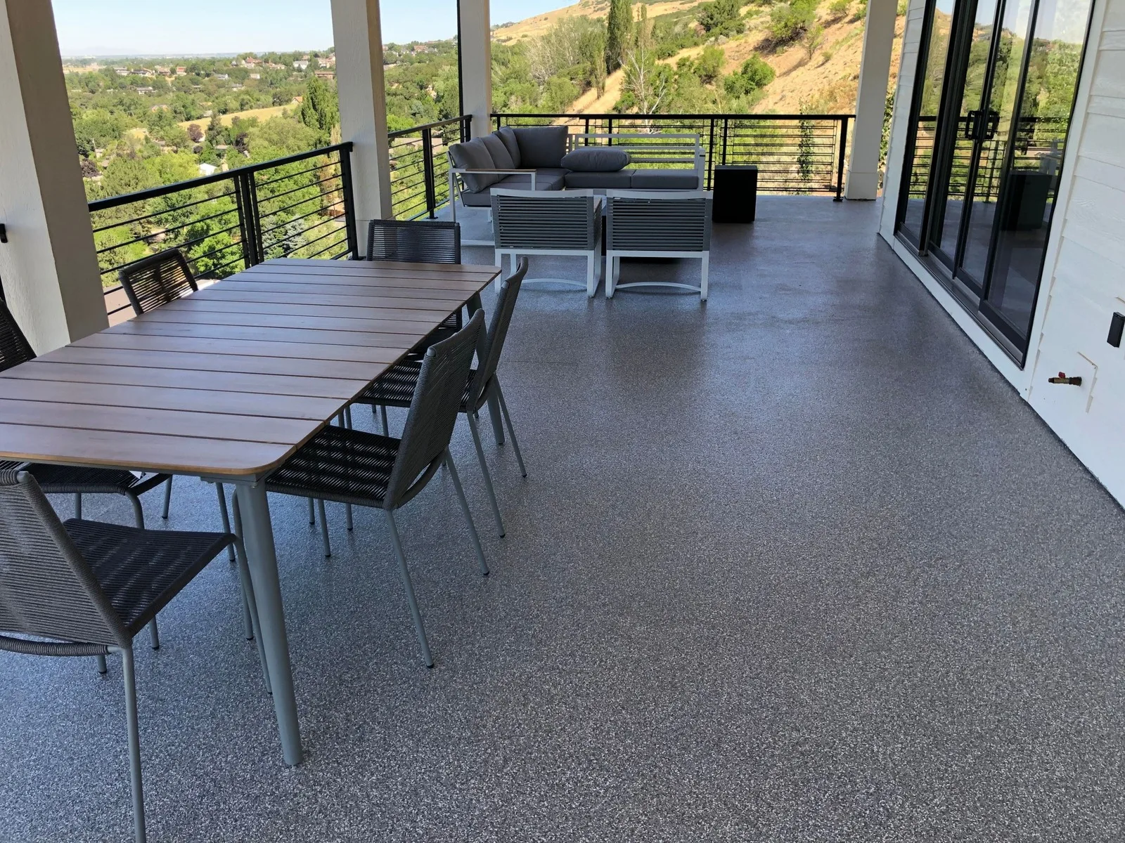 Coated covered deck set up for outdoor dining